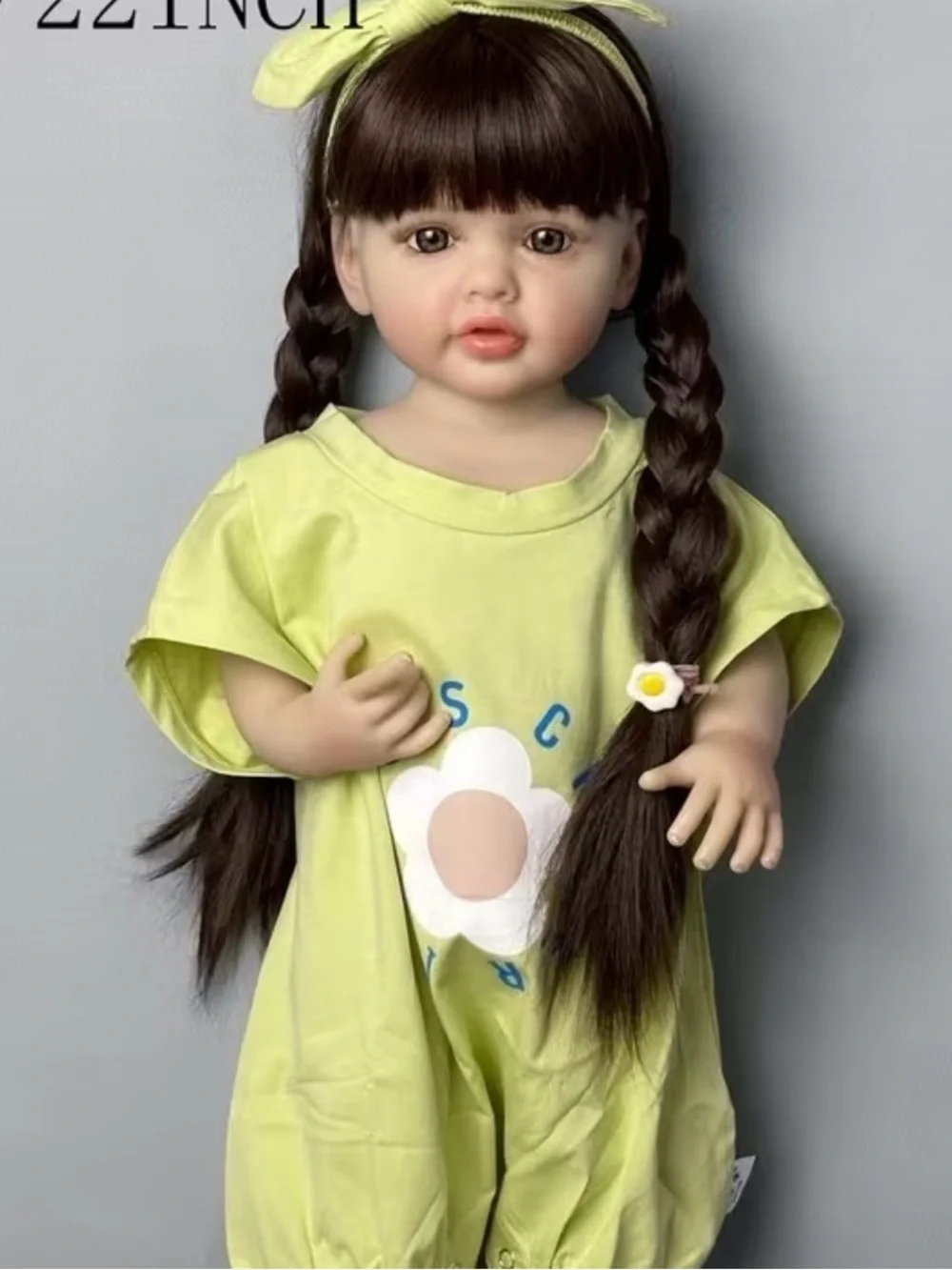 Plush Realistic Baby Doll in Light Green Outfit with Headband